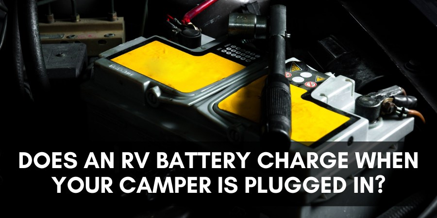 Does an RV battery charge when your camper is plugged in?