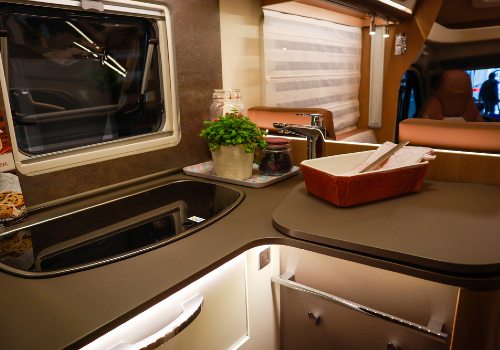 A kitchen in a Forest River RV Rockwood Geo