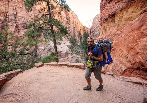 A man and his son exploring a Zion national park