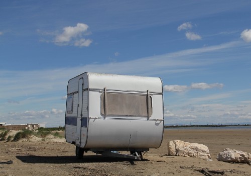 An old travel trailer on the ground