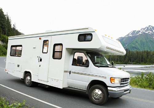 A recreational vehicle driving on a beautiful landscape