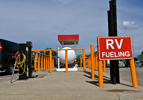 A sign RV fueling at gasoline station