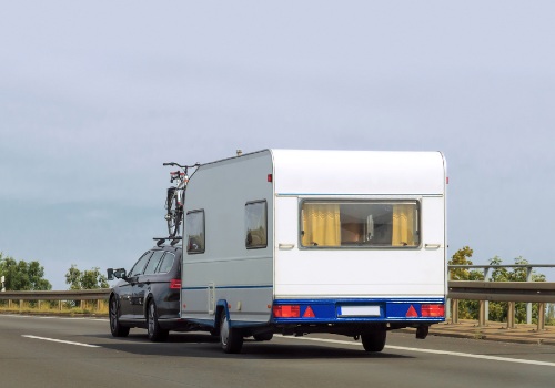 A SUV towing an RV