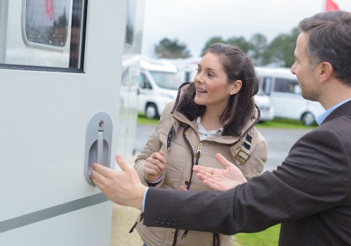 A woman buying a Coleman travel trailer